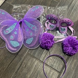 Purple butterfly mask, wings and headband antenna pom poms
